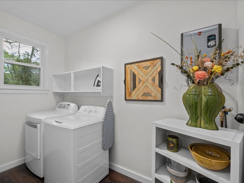 Artful Ansley laundry room with washer and dryer